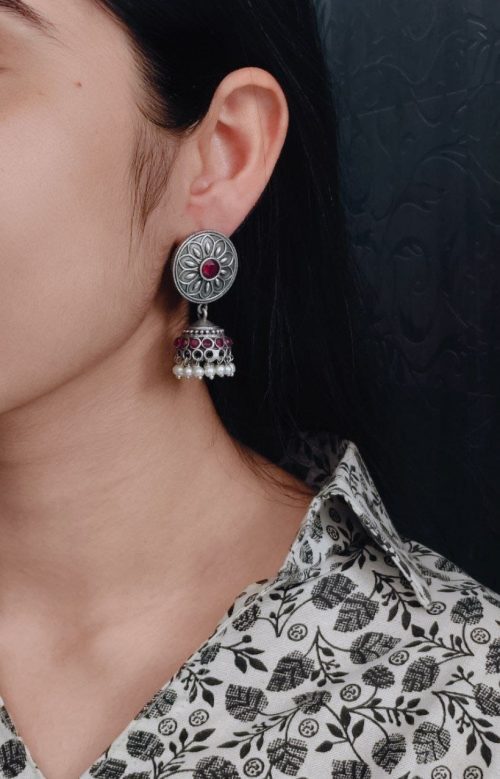 Oxidized silver jhumki earrings with stone and pearl detailing