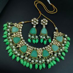 Gold plated bridal necklace set with AD stones and pearl accents
