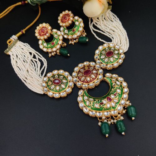 Handmade Meenakaari bridal necklace set with pearls and stones.