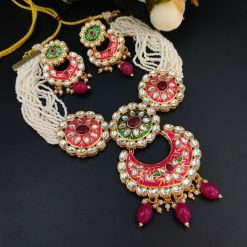 Handmade Meenakaari bridal necklace set with pearls and stones.