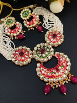 Handmade Meenakaari bridal necklace set with pearls and stones.