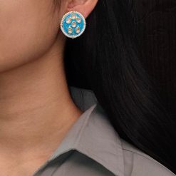 Meenakari golden earrings with pearl detailing for everyday elegance.