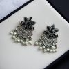 Silver-plated flower earrings with pearl detail for daily traditional wear.