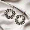 German silver leaf hook earrings in traditional dangler style.