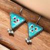 Hand-painted triangle stud earrings with pearls