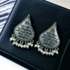 Handcrafted oxidized mantra earrings with pearl accents for traditional wear.