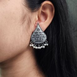 Handcrafted oxidized mantra earrings with pearl accents for traditional wear.