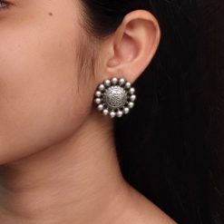 Silver plated flower stud earrings for daily ethnic wear.