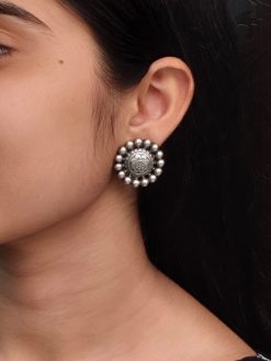 Silver plated flower stud earrings for daily ethnic wear.