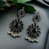 oxidized silver plated flower dangler earrings with stone and pearl detailing