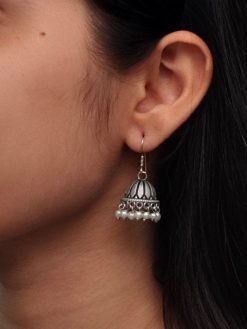 german silver jhumki earrings with pearl dangler design