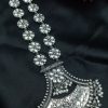 Oxidised floral necklace with pearl and stone work