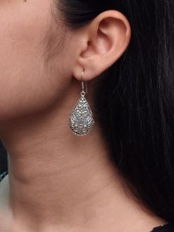 Handcrafted floral hook earrings in oxidized German silver