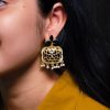 Gold plated floral art dangler earrings with stone and pearl work