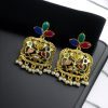 Gold plated floral art dangler earrings with stone and pearl work