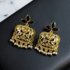 Gold plated floral art dangler earrings with stone and pearl work