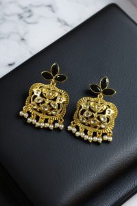 Gold Plated Floral Art Earrings | Stone & Pearl Work for Best Ethnic Wear Dangler Jewelry - color: "Black-White"