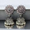 Oxidised silver plated jhumka earrings with stone and pearl detailing