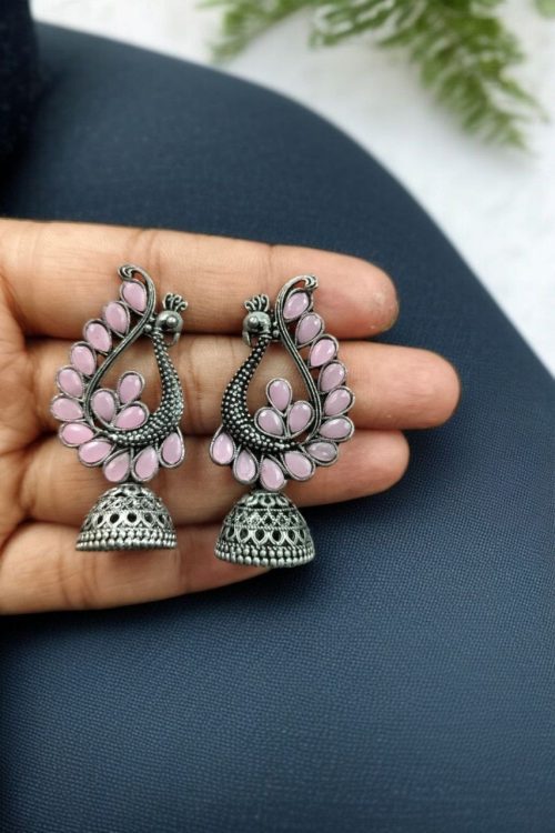 Antique oxidised peacock jhumki earrings in German silver with stone work