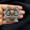 Antique oxidised peacock jhumki earrings in German silver with stone work