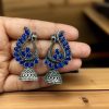 Antique oxidised peacock jhumki earrings in German silver with stone work