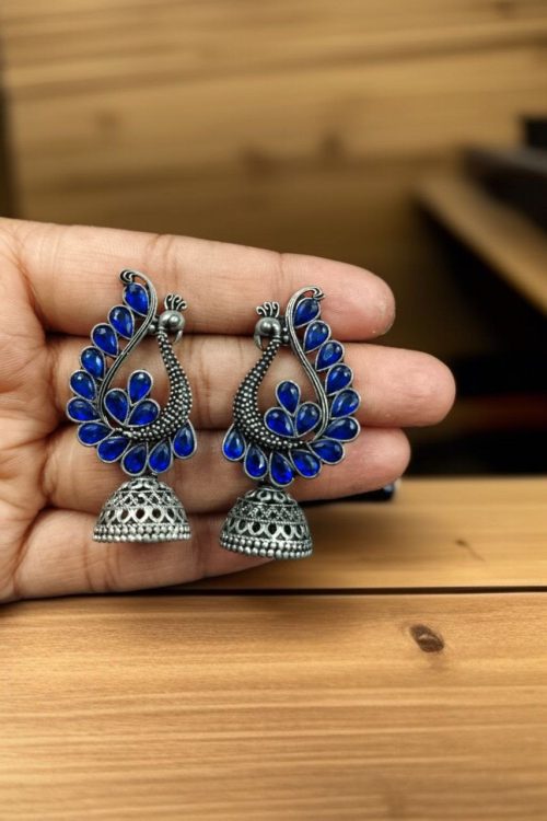 Antique oxidised peacock jhumki earrings in German silver with stone work