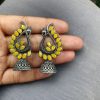 Antique oxidised peacock jhumki earrings in German silver with stone work