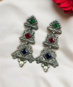 Floral 3 layer earrings with pearls and stone accents.