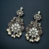 Silver plated peacock dangler earrings with stone and pearl detailing