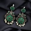 Silver plated peacock dangler earrings with stone and pearl detailing