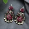 Silver plated peacock dangler earrings with stone and pearl detailing