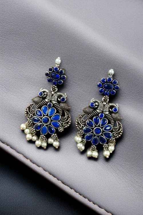 Silver plated peacock dangler earrings with stone and pearl detailing