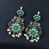 Silver plated peacock dangler earrings with stone and pearl detailing