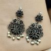 Silver plated peacock dangler earrings with stone and pearl detailing