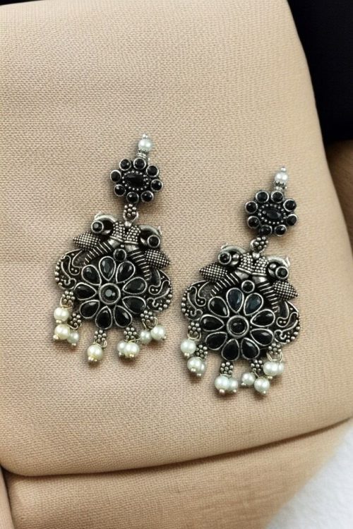 Silver plated peacock dangler earrings with stone and pearl detailing