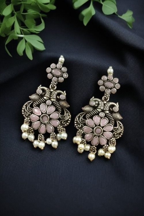 Silver plated peacock dangler earrings with stone and pearl detailing