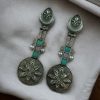 Lightweight oxidised silver plated flower dangler earrings with pearl and stone work.