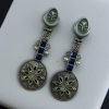 Lightweight oxidised silver plated flower dangler earrings with pearl and stone work.