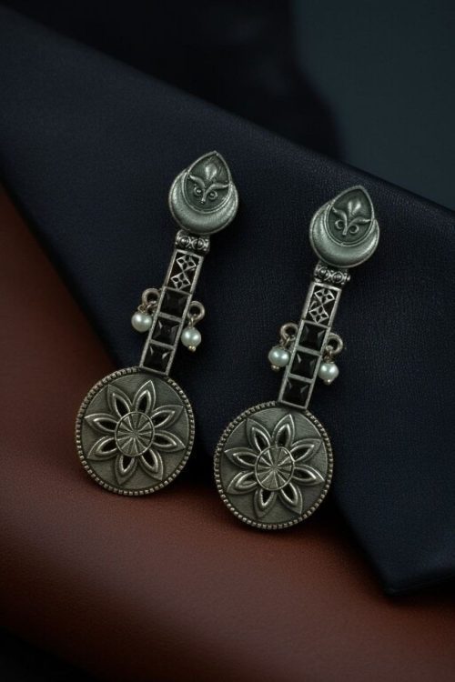 Lightweight oxidised silver plated flower dangler earrings with pearl and stone work.