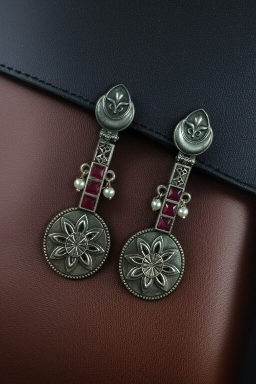 Lightweight oxidised silver plated flower dangler earrings with pearl and stone work.