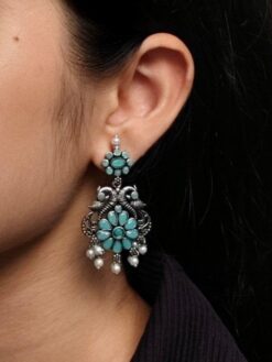 Silver plated peacock dangler earrings with stone and pearl detailing