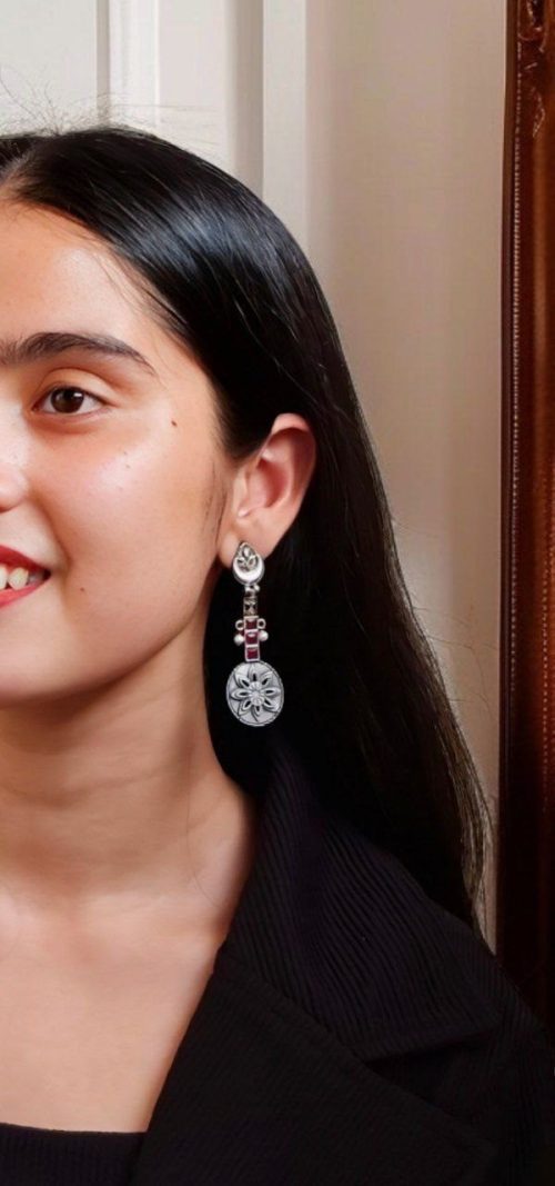 Lightweight oxidised silver plated flower dangler earrings with pearl and stone work.