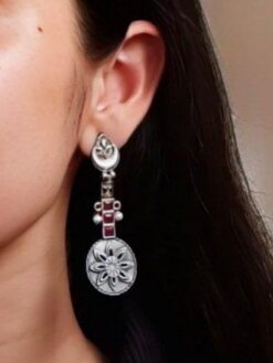 Lightweight oxidised silver plated flower dangler earrings with pearl and stone work.