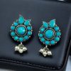 Silver plated oxidised flower stud earrings with pearl and stone work