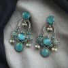 Monalisa stone dangler earrings with pearl in silver plated finish