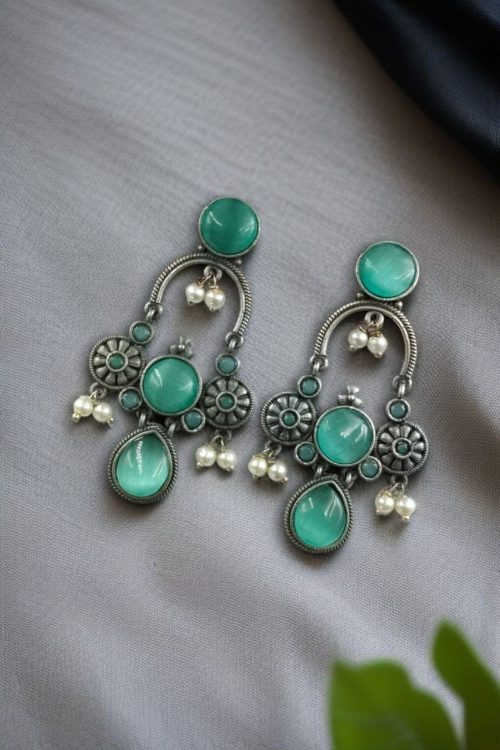 Monalisa stone dangler earrings with pearl in silver plated finish