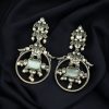 Silver look-alike bird earrings with stone and pearl work in oxidized finish.