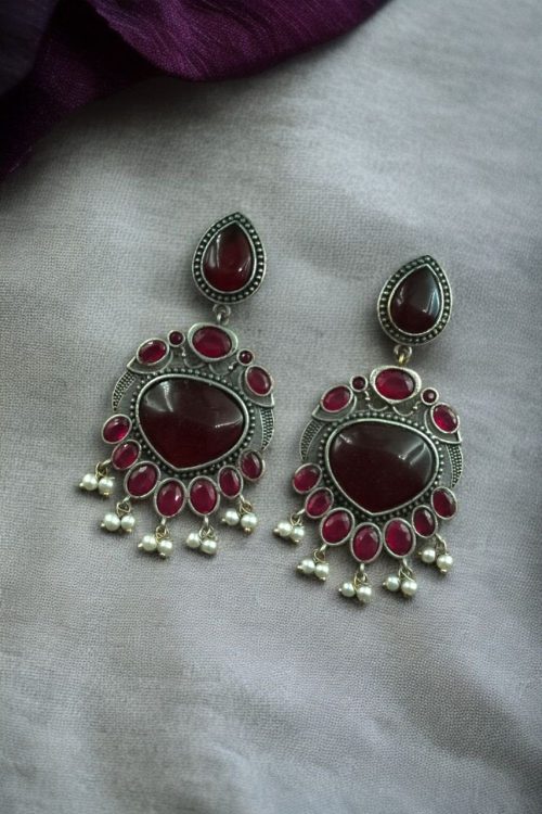 Oxidized bird design silver replica earrings with stone and pearl