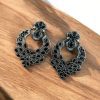 Oxidized silver replica dangler earrings with peacock design and stone work.