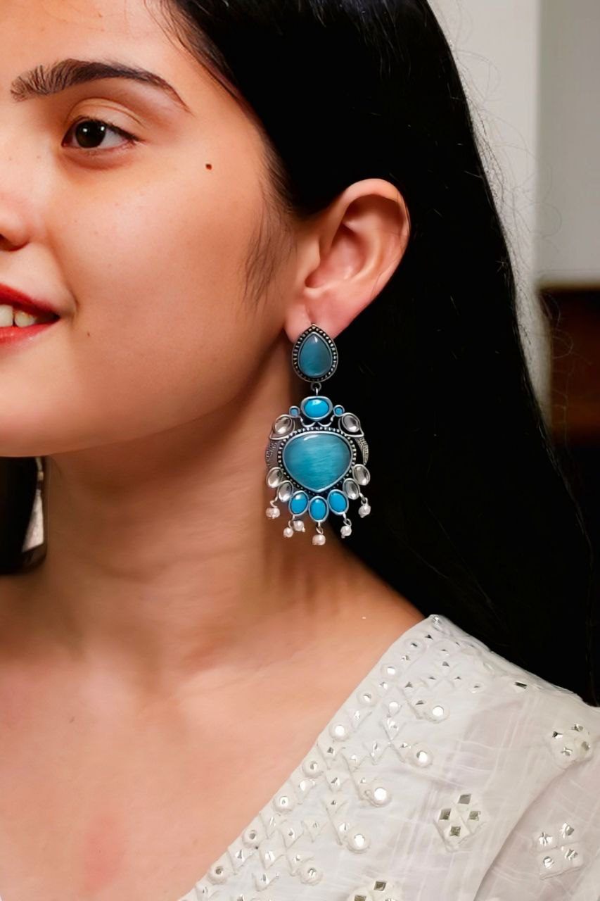 Oxidized bird design silver replica earrings with stone and pearl